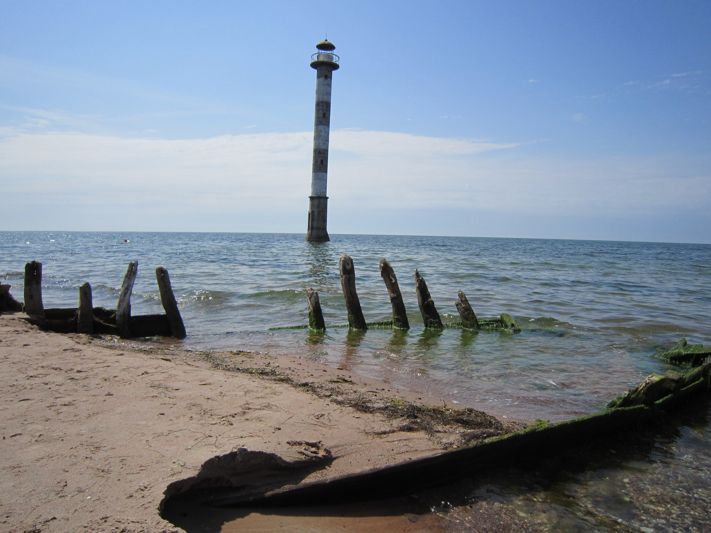 Lighthouse & shipwrecked boat