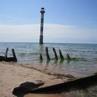 Lighthouse & shipwrecked boat