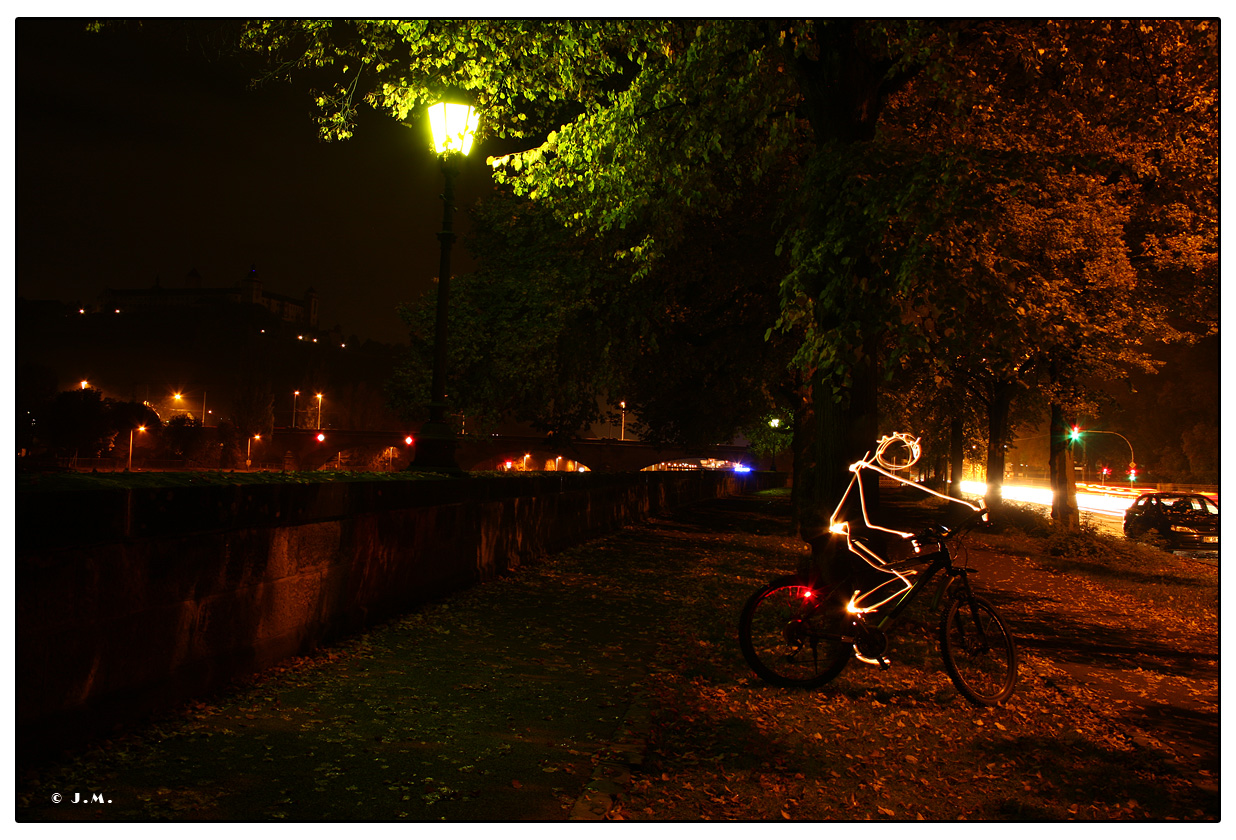 Lightpainting - Fahrradfahrer Kurve