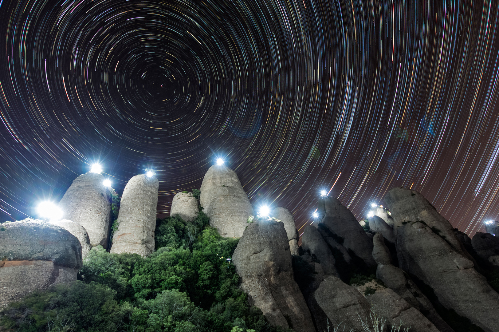 Lights in Montserrat mountain Park. Circumpolar.