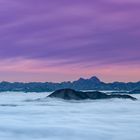 Lila Wolken über den Julischen Alpen