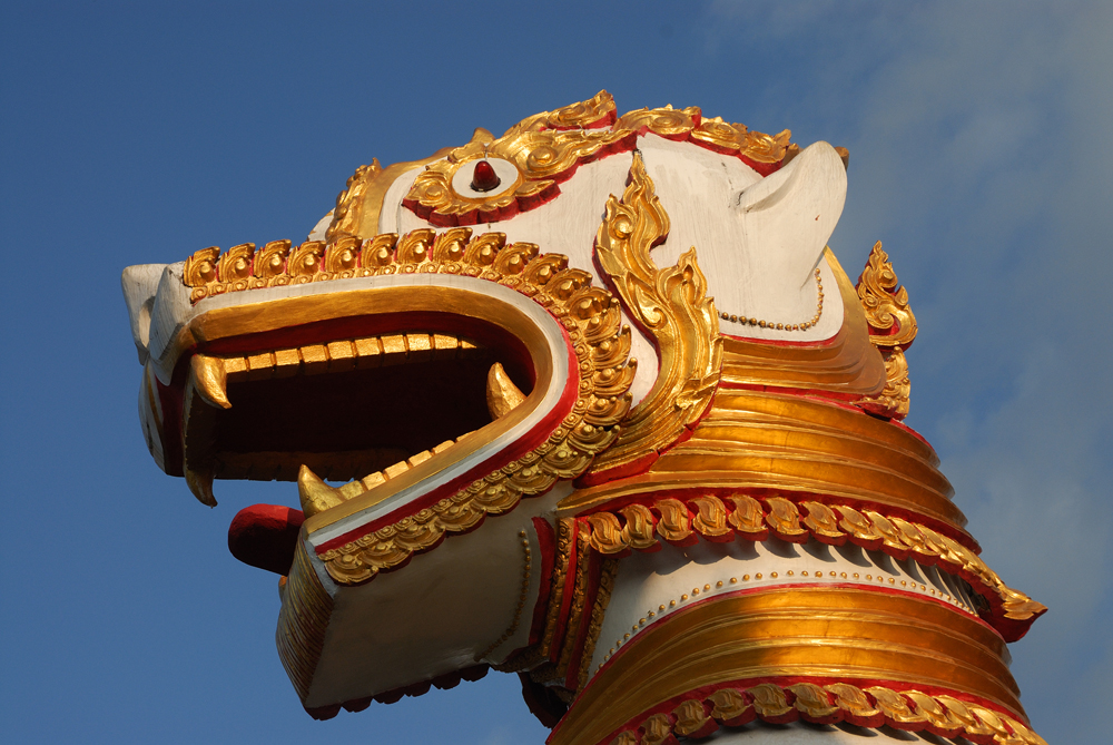 Lion head at the entrance of Wat Wang Wiwekaram in Sangkhlaburi