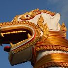 Lion head at the entrance of Wat Wang Wiwekaram in Sangkhlaburi