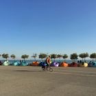 Lisbon waterfront bicycle rider