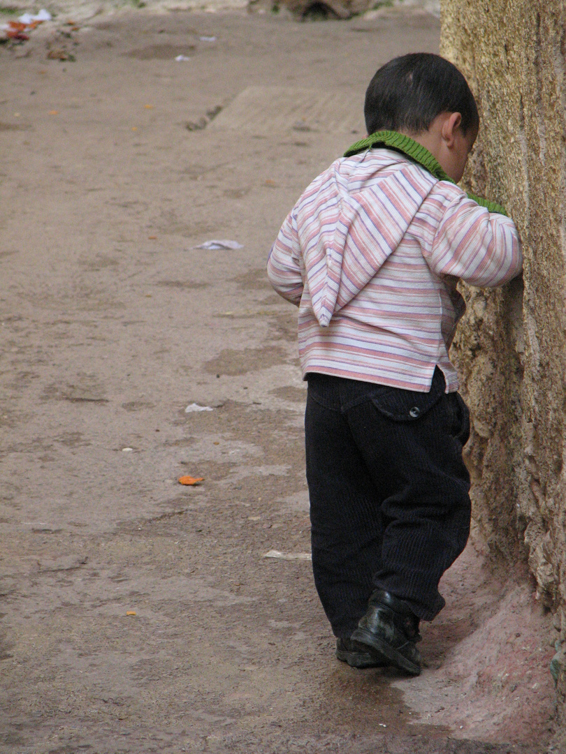 little boy and wall