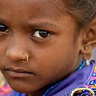 Little girl, big eyes and blue dress