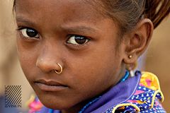 Little girl, big eyes and blue dress