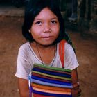 Little girl selling cambodian scarfs