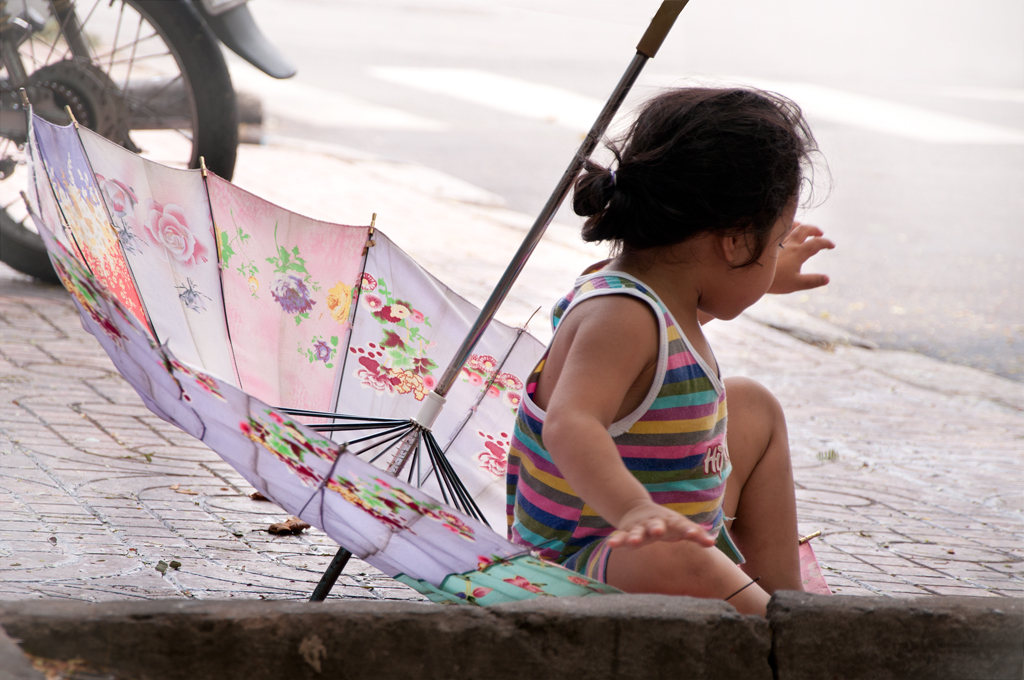 little girl with umbrella | Saigon | Vietnam