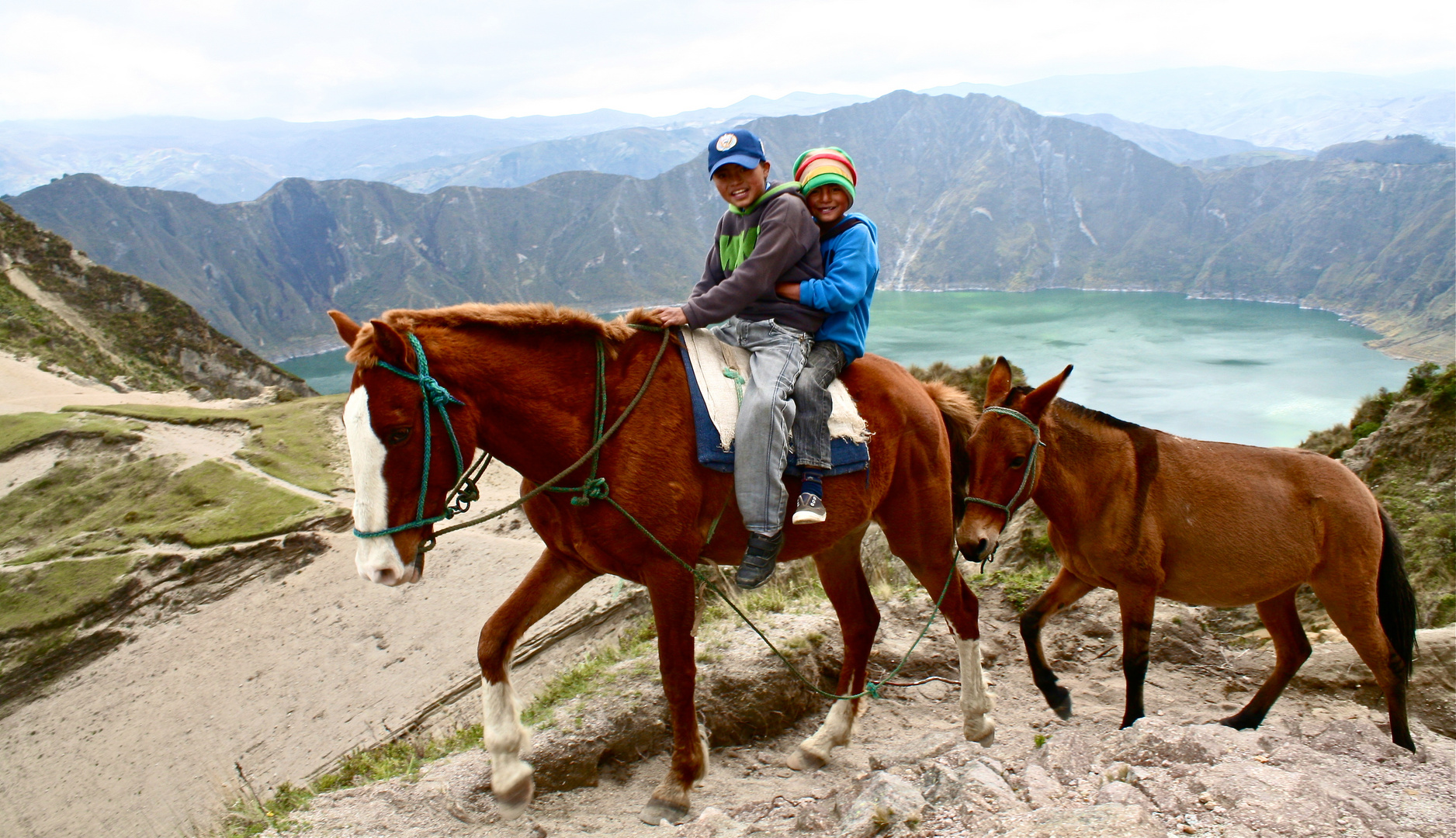 Little Kids riding the Quilotoa-Loop in Ecuador