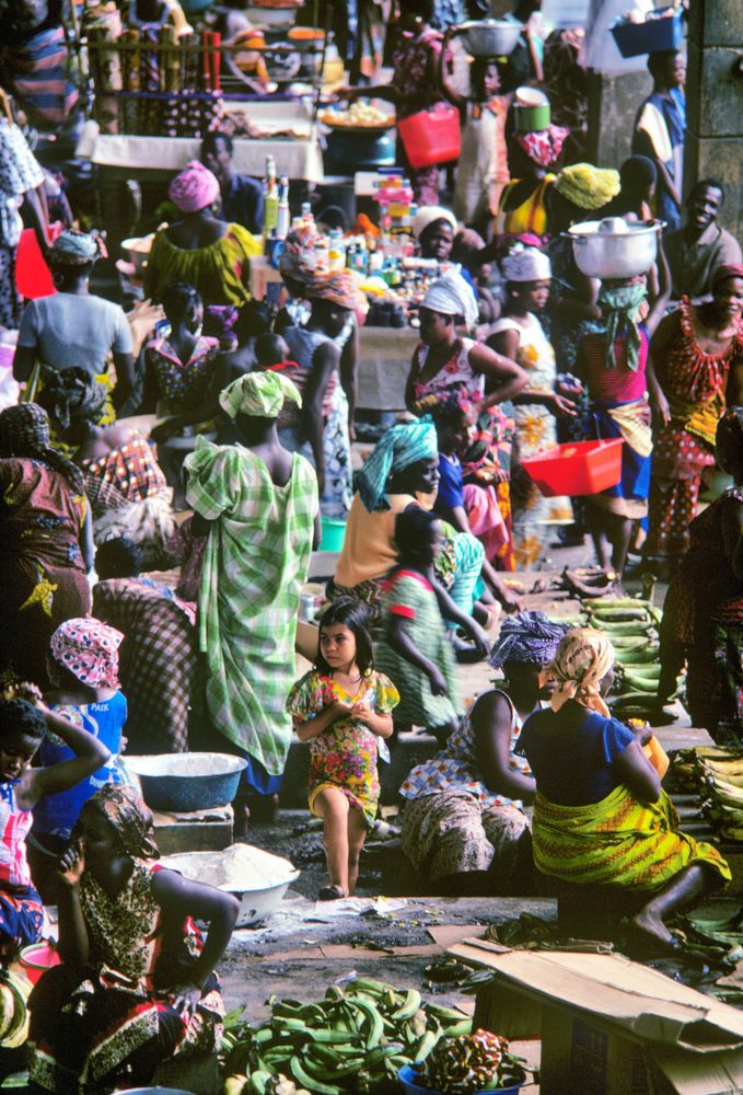 Little white girl on the market in Abidjan