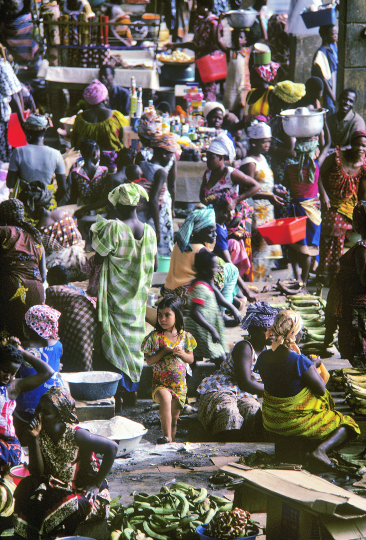 Little white girl on the market in Abidjan