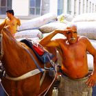 Loading sacks of coffee beans