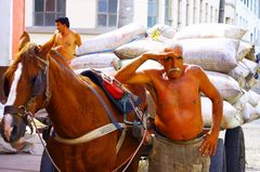 Loading sacks of coffee beans