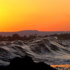 L'onda al calar del sole