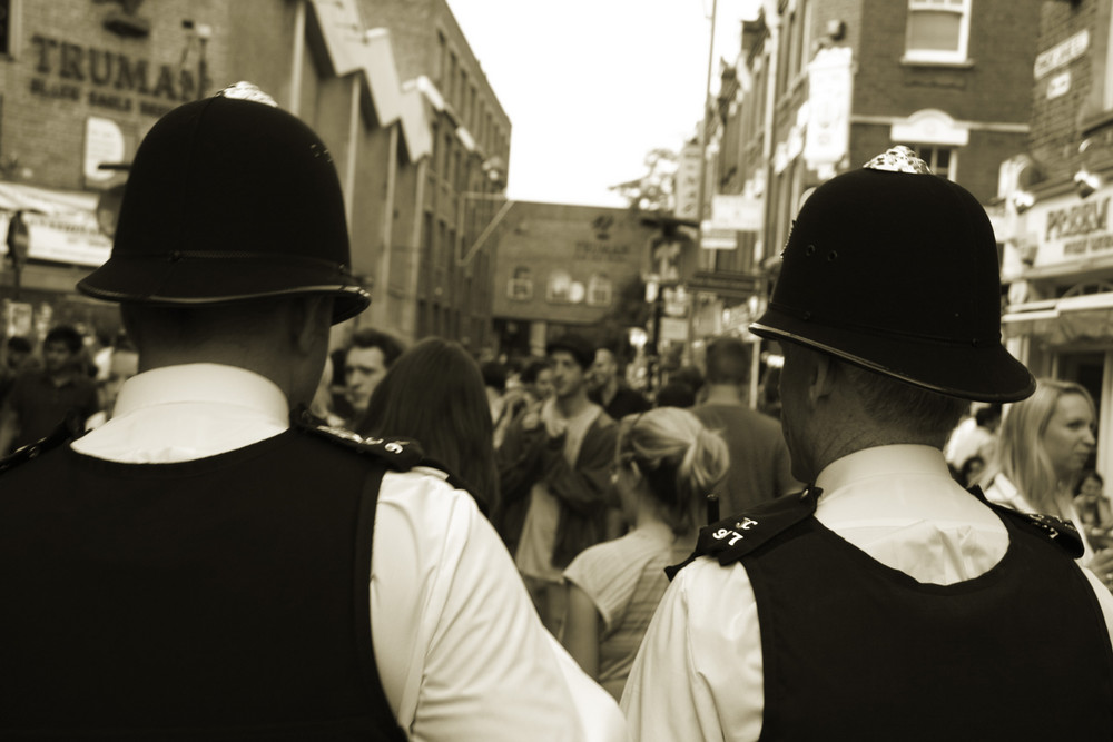 London Bricklane: Two Bobbies and Crowd