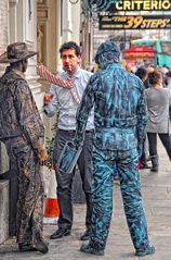 London:  Streetworker am Picadilly Circus