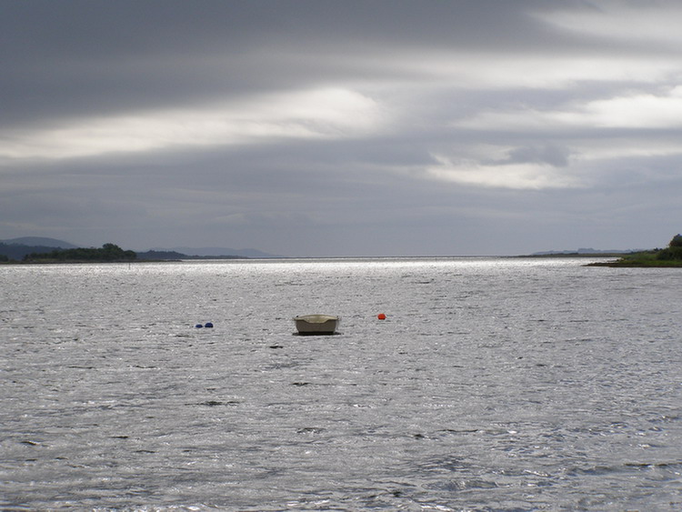 lonely boat on the sea