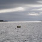 lonely boat on the sea