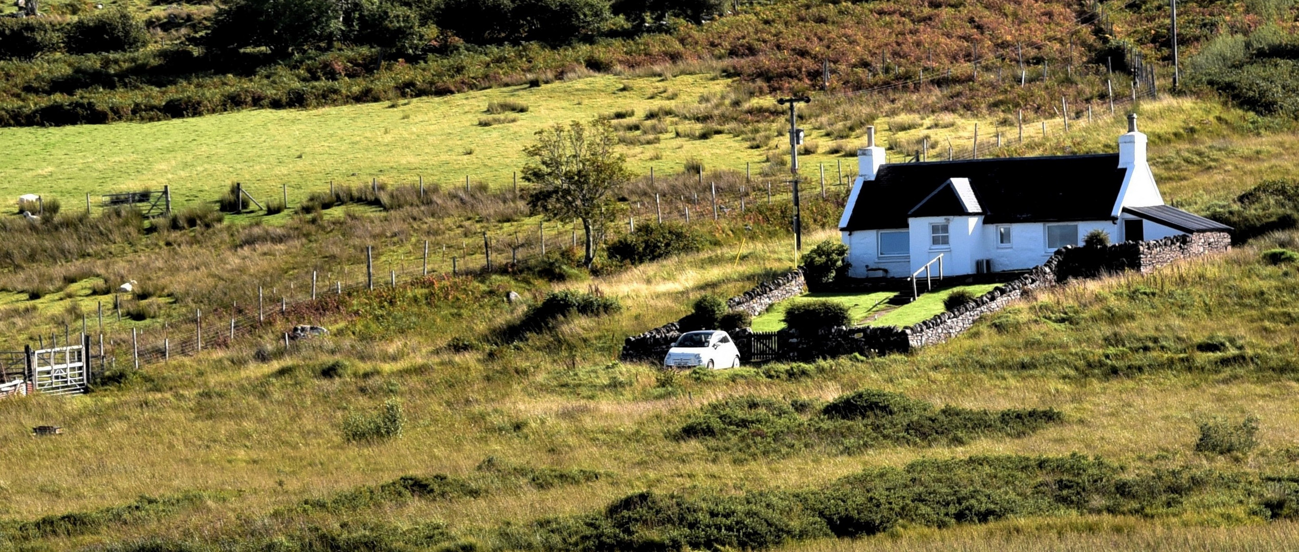 Lonely hillside cottage somewhere in Western Scotland