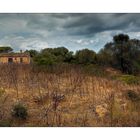 lonely house with strong clouds