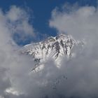 Lonely mountain surrounded by clouds