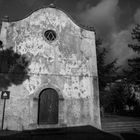 Long evening shadows on the small church