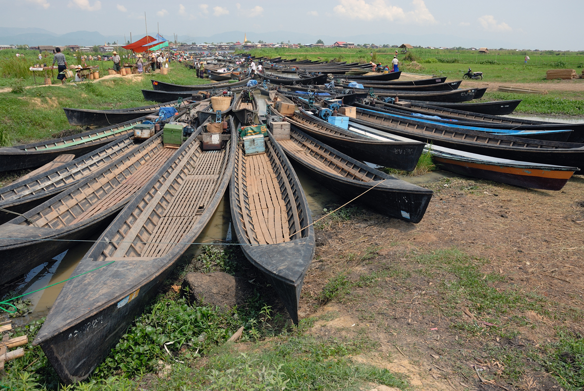 Long tail boats on the dam at Inle lake