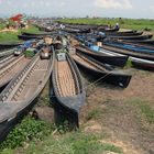 Long tail boats on the dam at Inle lake