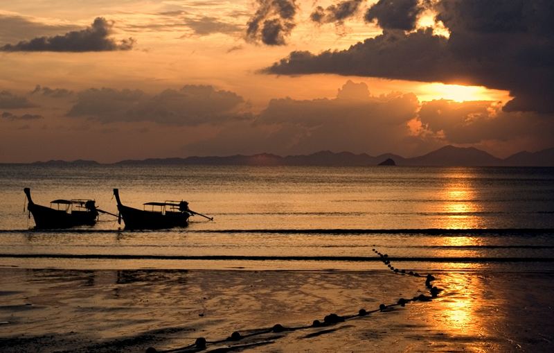 Longtailboats at sunset