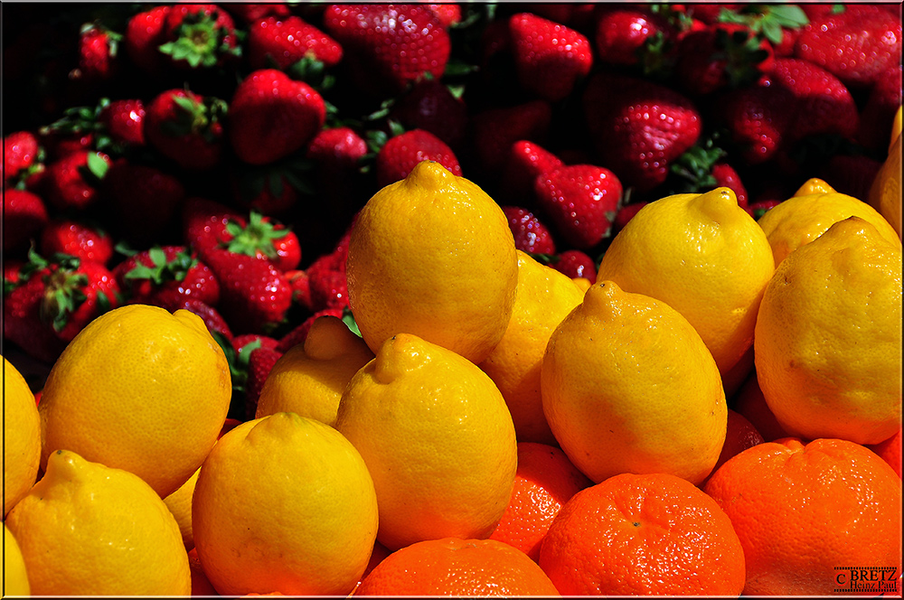 Los limones, mandarinas, fresas