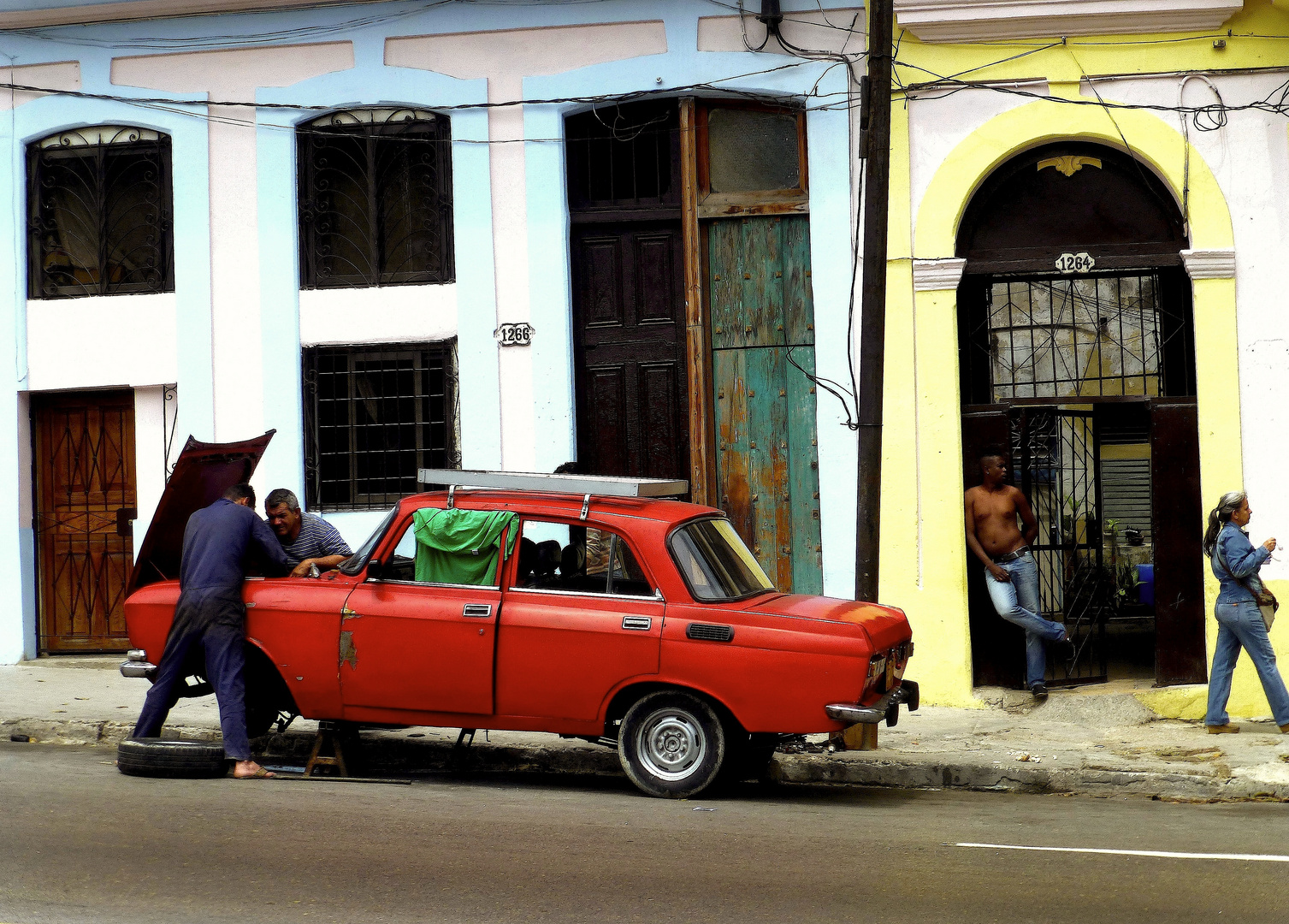 < Los Mecanicos >