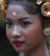 Lovely Balinese dancer at a temple festival