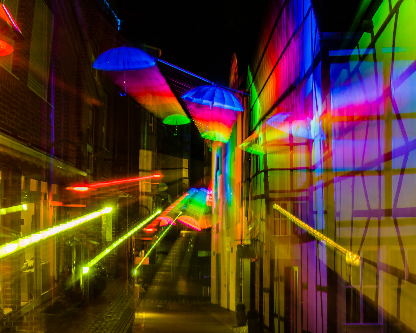 Lucy im Himmel mit Regenschirmen