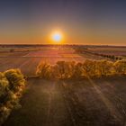 Luftaufnahme / Panorama von Feldern bei Sonnenuntergang