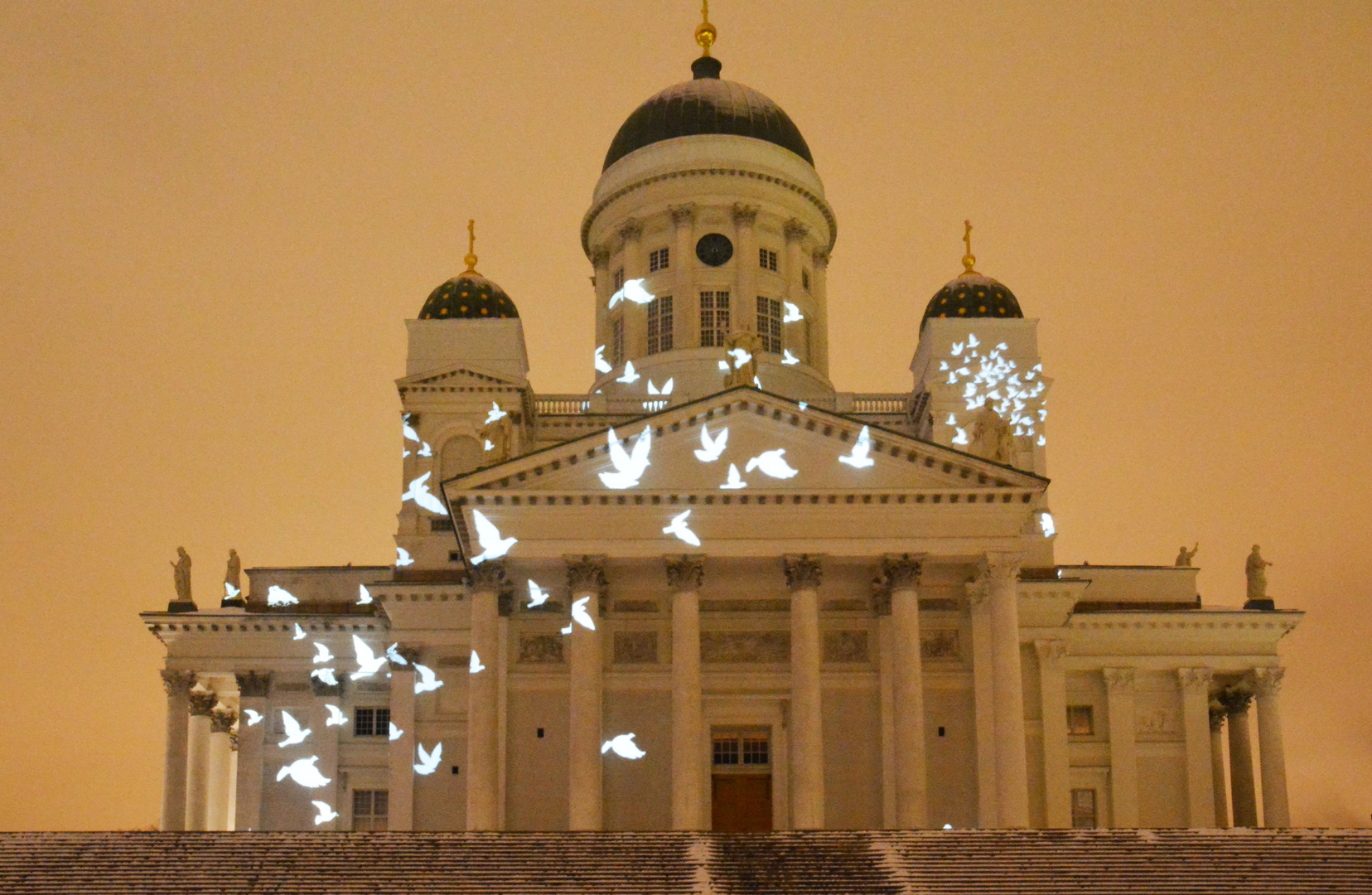 LuxHelsinki Lightart on the wall ofLutheran cathedral