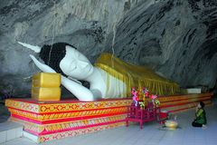 Lying Buddha at the entrance to the cave