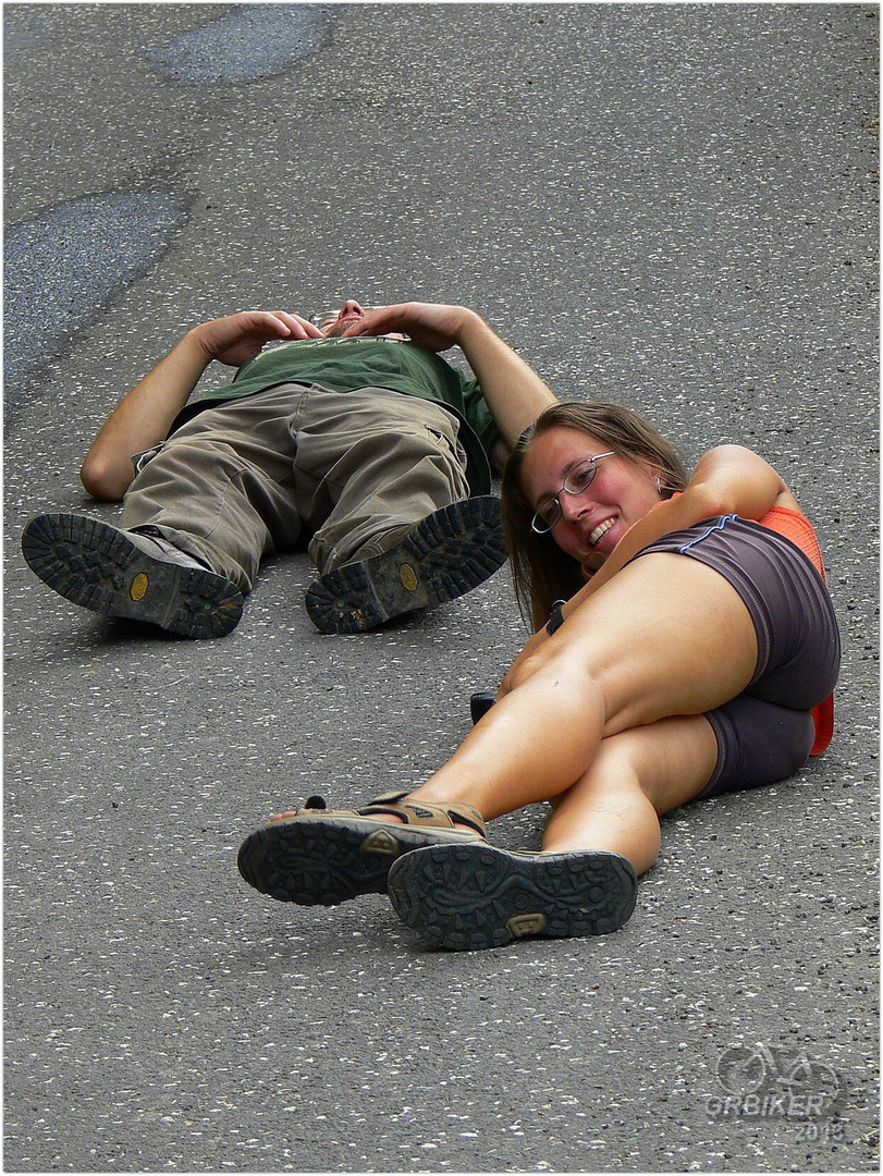 Lying on asphalt