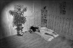 Lying Woman in Shabby Area