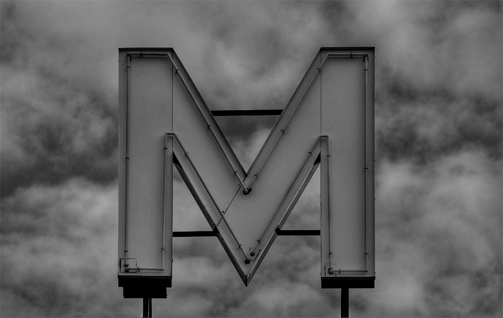 "M"