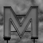 "M"