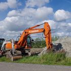 Mach' mal Pause: Bagger-Papa mit Sohn