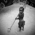 Madagascar - Child with wooden toy