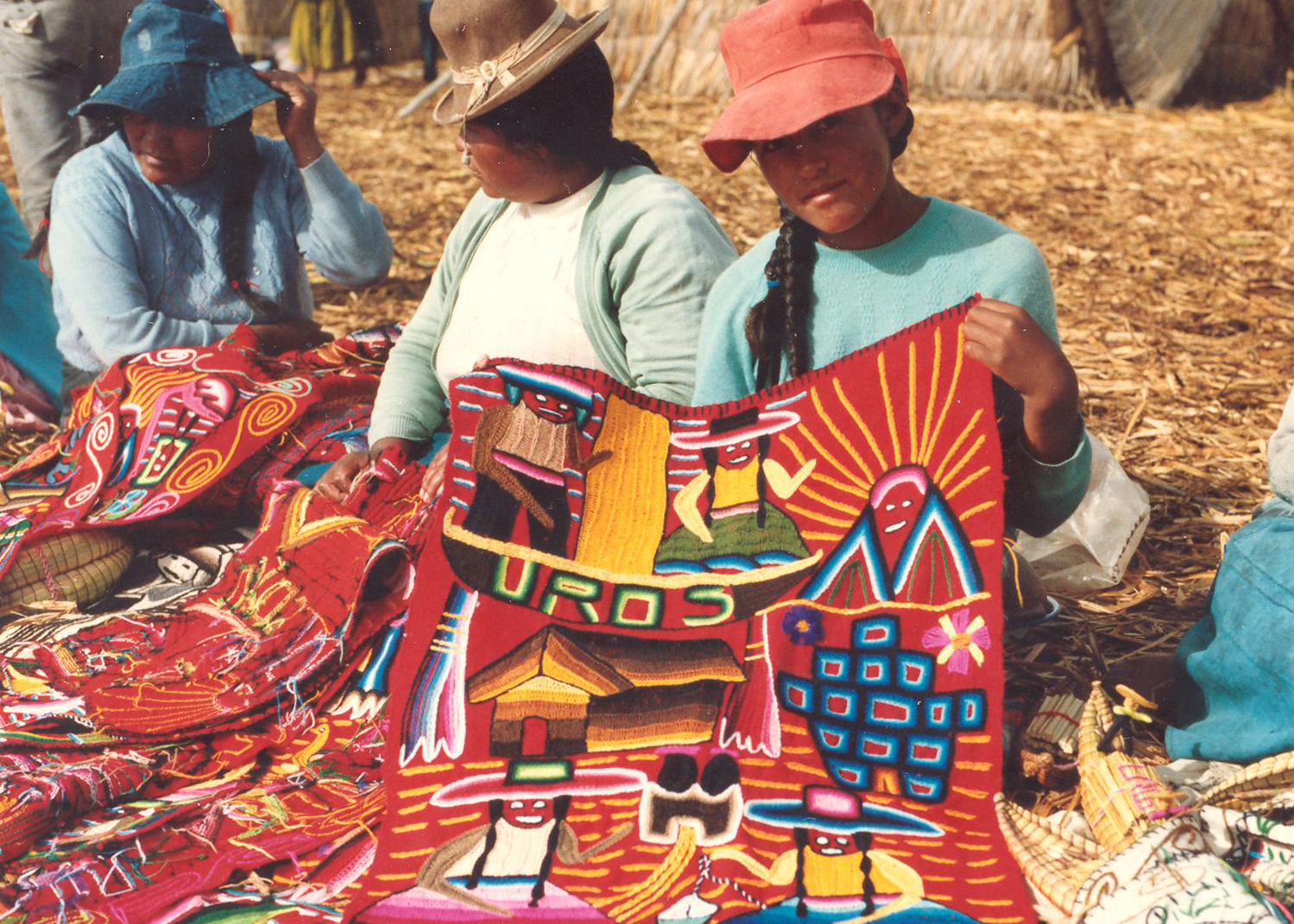 Mädchen auf dem Titicaca-See / Peru