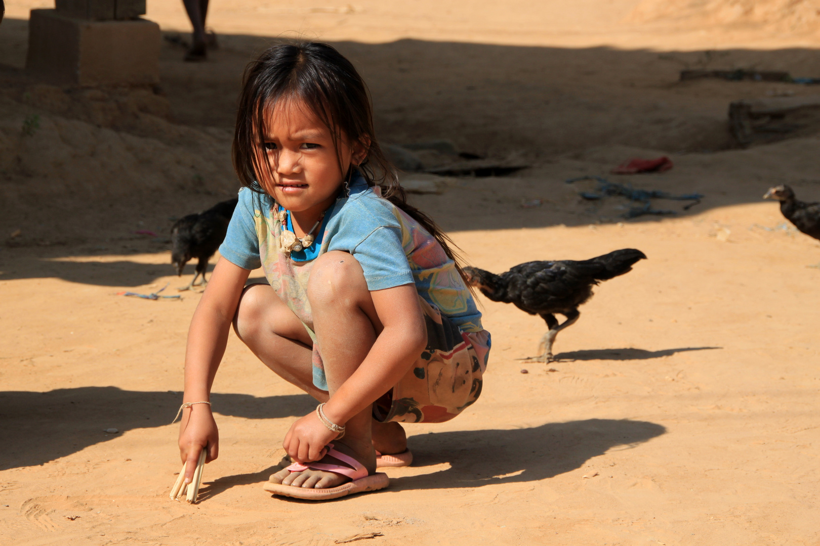 Malendes Mädchen in Laos
