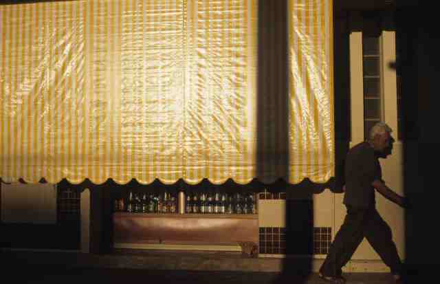 Man in front of shop