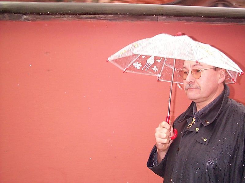 man in red and rain