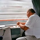 man looking on the window