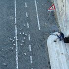 man & pigeons, eating.