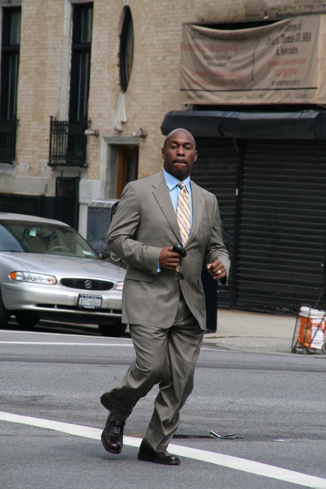 man running to the church in harlem